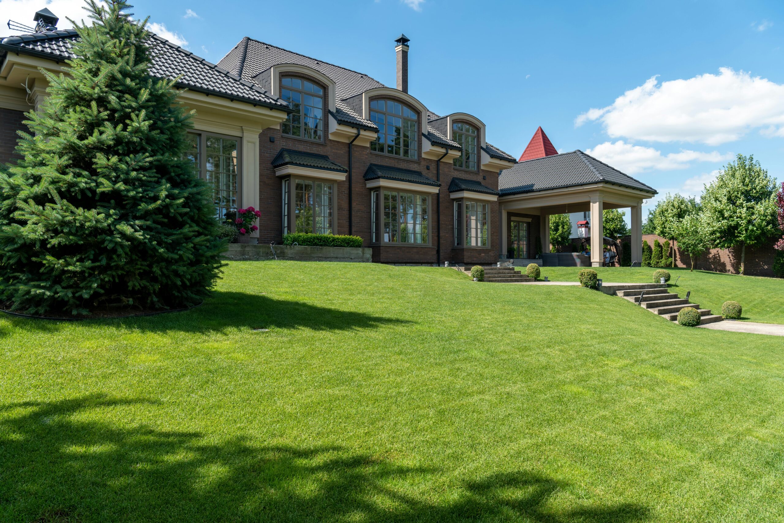 Charlotte landscaping crew assessing residential property for free quote